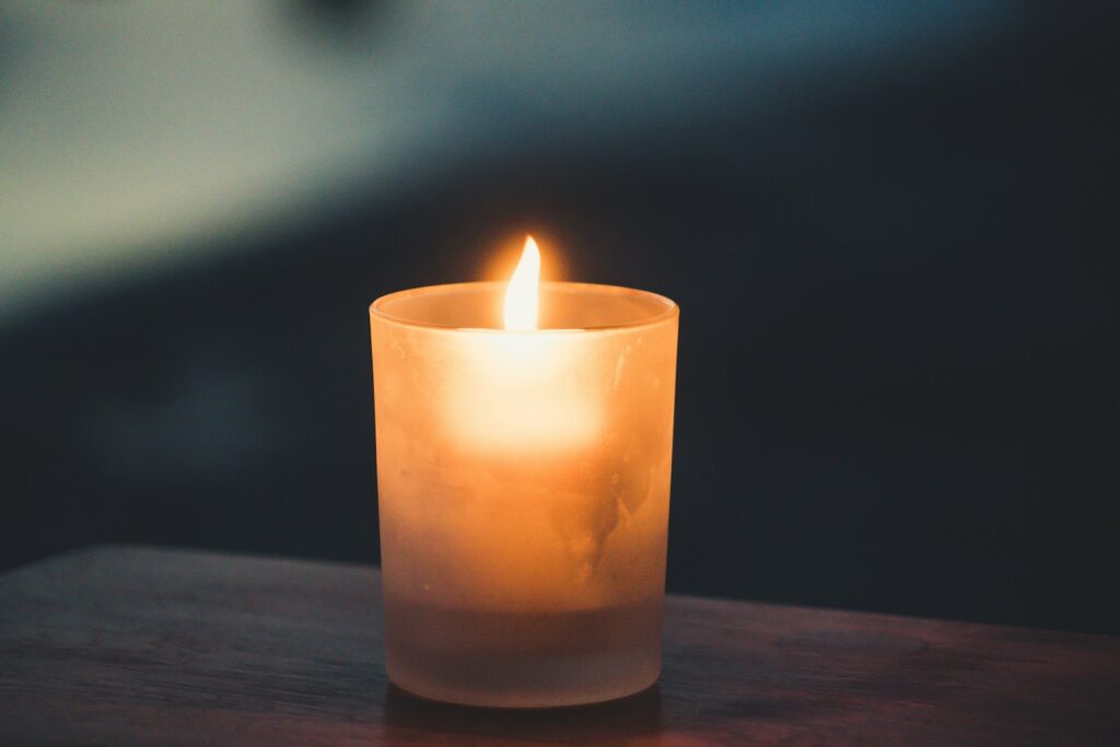 Memorial candle after a cremation abroad
